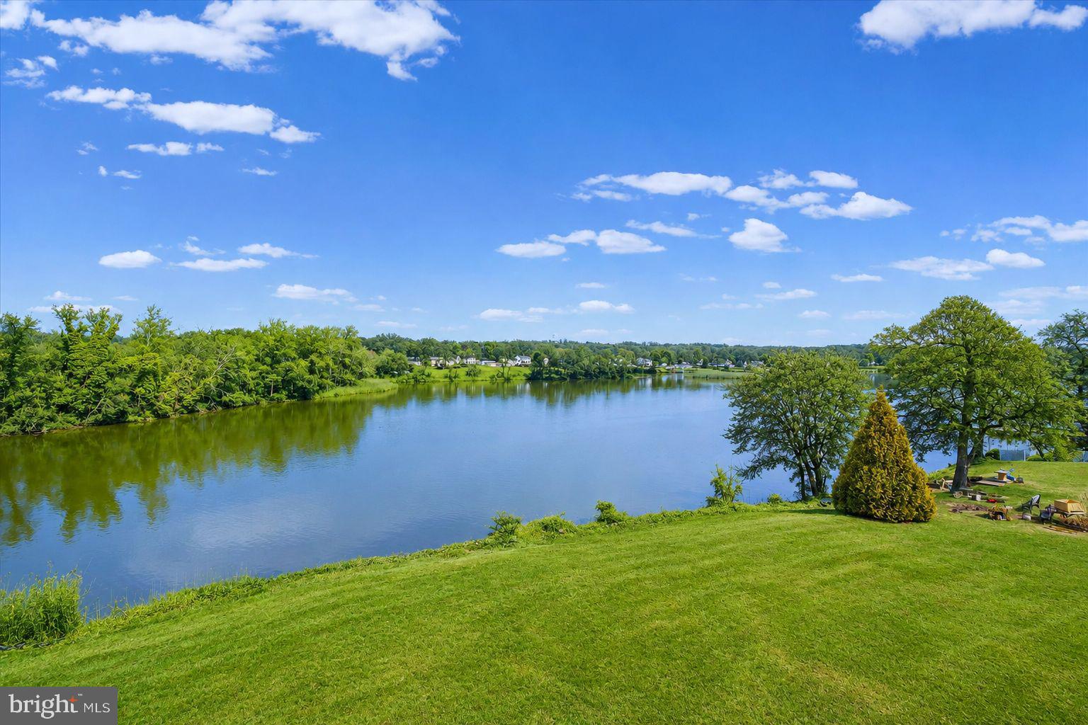 11030 Bird River Grove Road White Marsh, MD 21162 - Photo 2 of 53 a view of a lake and outdoor space