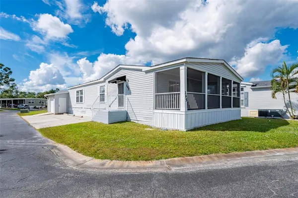 an aerial view of a house with a garden