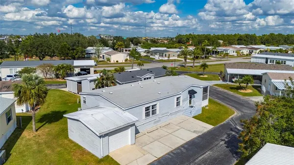a view of backyard of a house