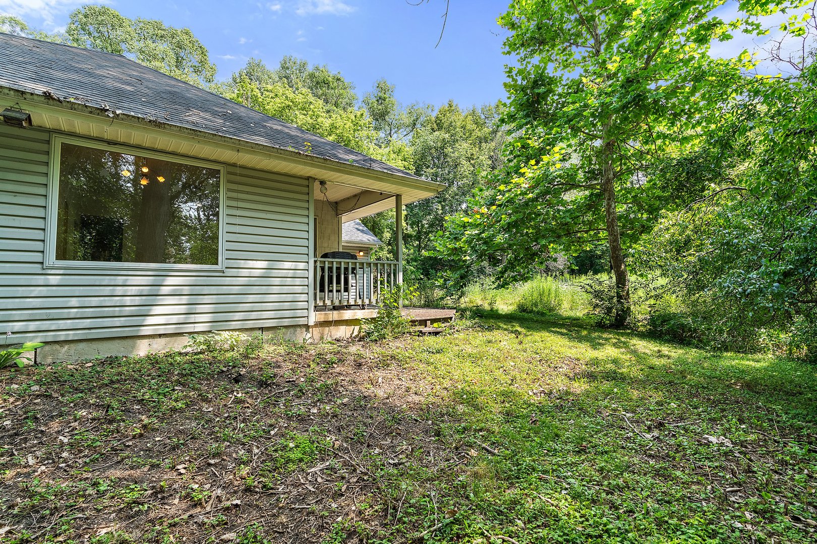 18707 Stevens Road Marengo, IL 60152 - Photo 24 of 35 a view of a house with a yard