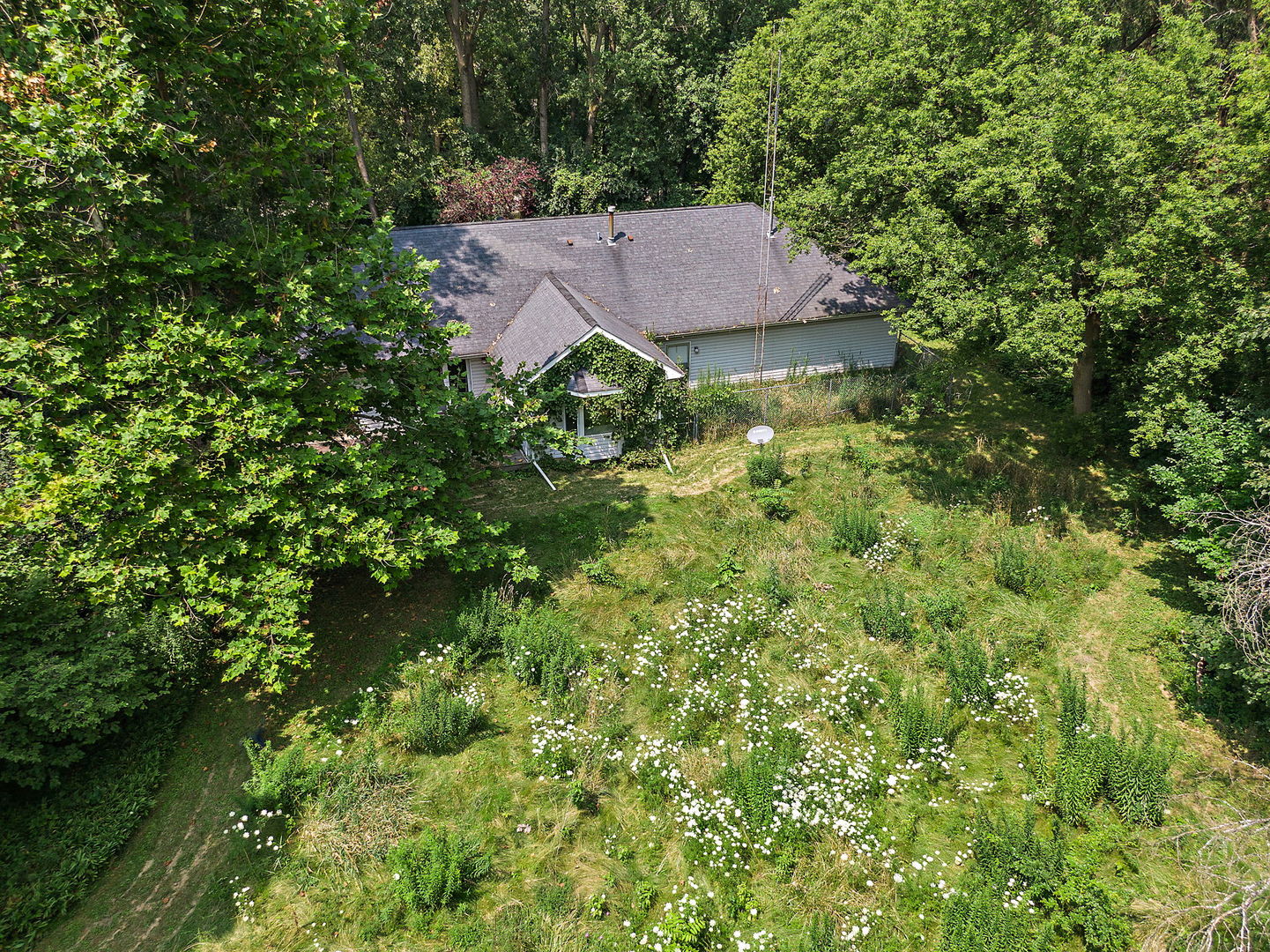 18707 Stevens Road Marengo, IL 60152 - Photo 34 of 35 a view of a house with a yard
