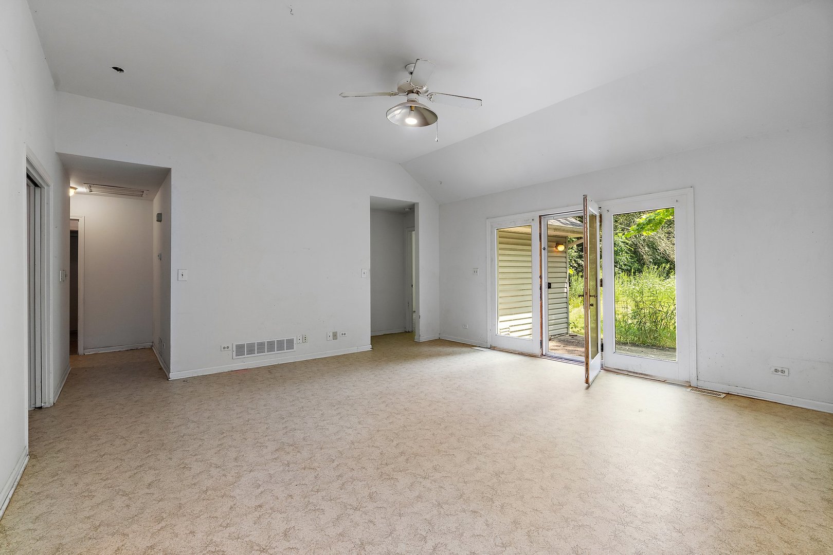 18707 Stevens Road Marengo, IL 60152 - Photo 4 of 35 a view of a livingroom with a ceiling fan and window