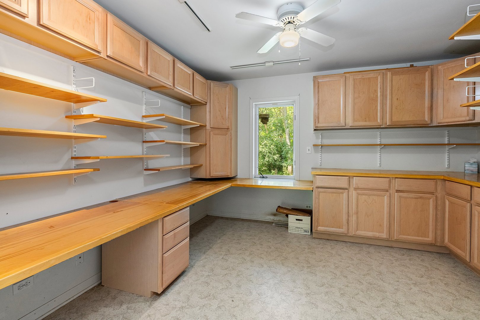 18707 Stevens Road Marengo, IL 60152 - Photo 8 of 35 a kitchen with white cabinets and window