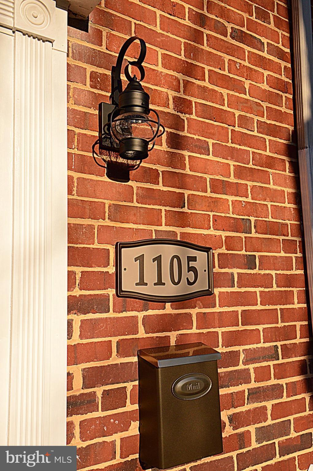 1105 Wedgewood Road Baltimore, MD 21229 - Photo 2 of 30 a close up of a street