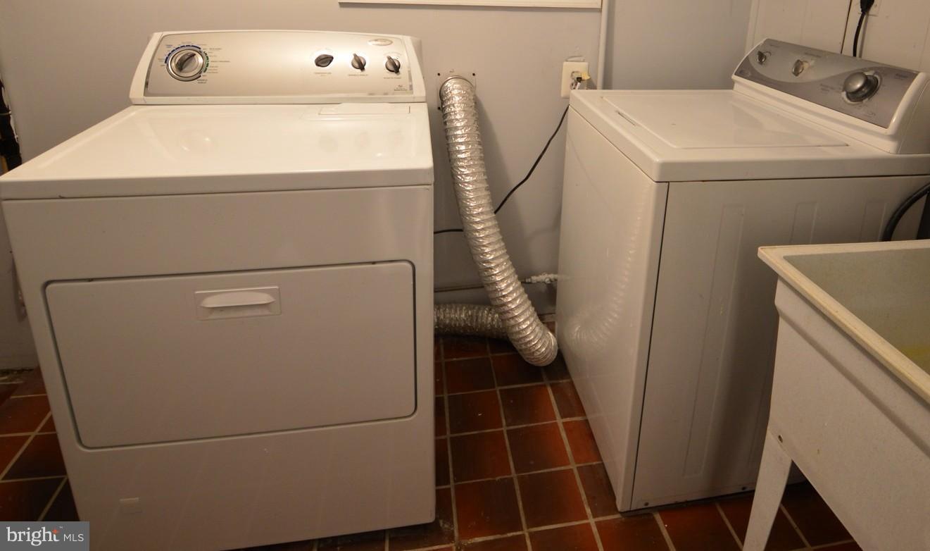 1105 Wedgewood Road Baltimore, MD 21229 - Photo 30 of 30 a utility room with dryer and washer