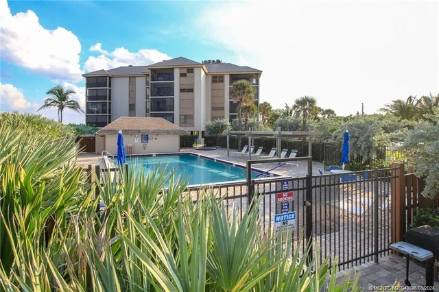 a view of building with yard