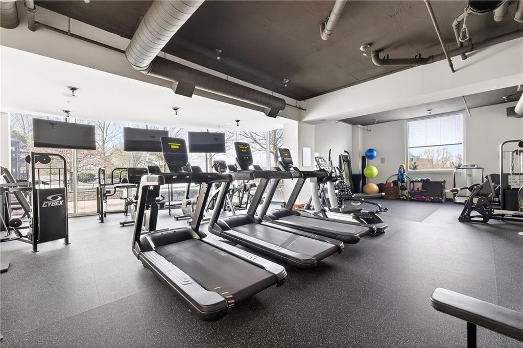 3300 Windy Ridge Parkway Southeast, Unit 1019 Atlanta, GA 30339 - Photo 31 of 37 a view of a room with gym equipment