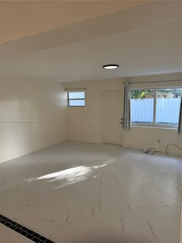 a view of a kitchen with a sink
