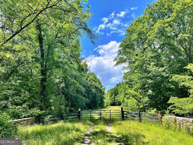 a view of swimming pool with a yard