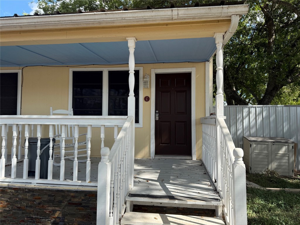 4413 Nixon Lane, Unit C Austin, TX 78725 - Photo 2 of 9 a view of a balcony with door