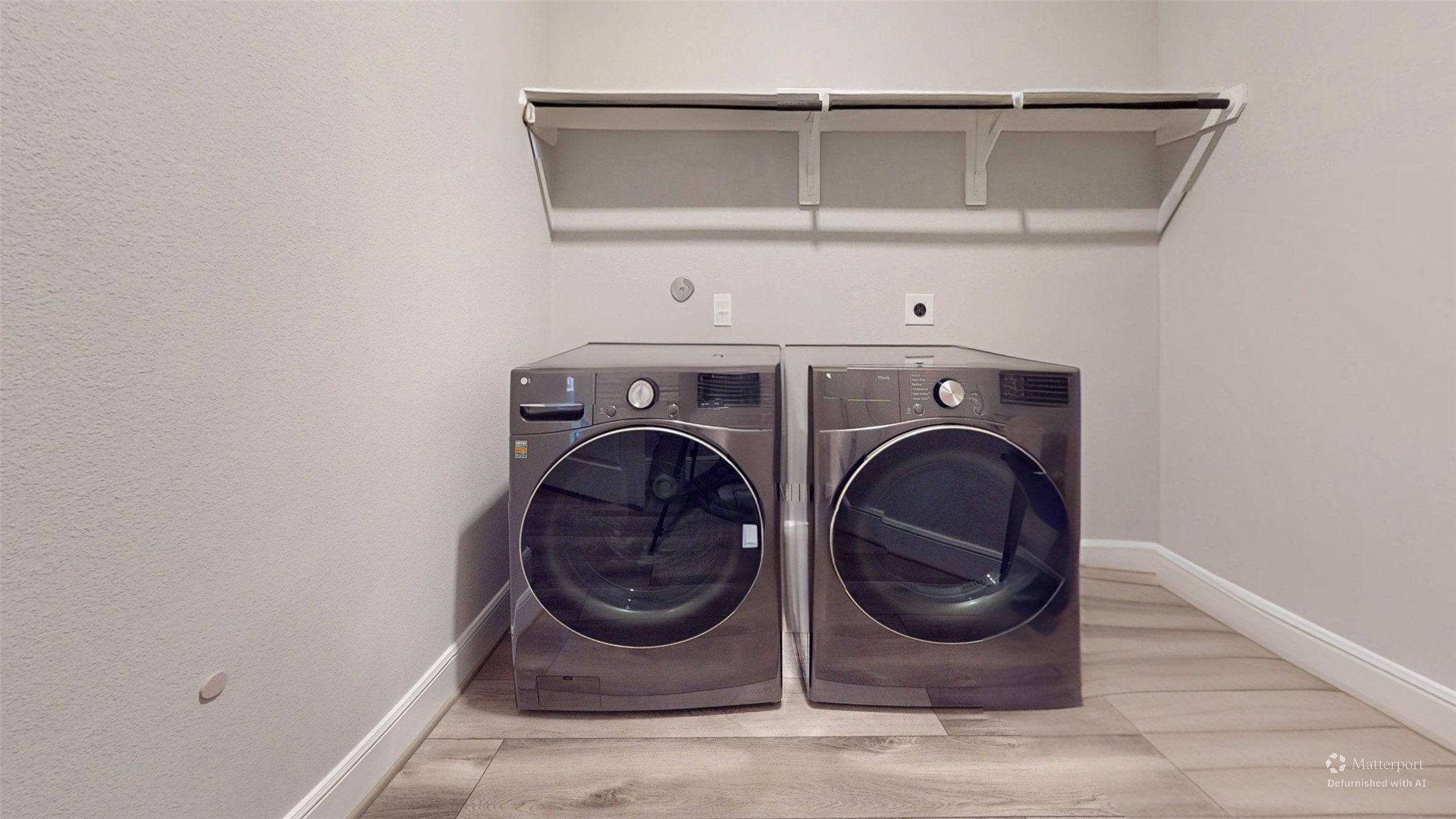 8305 Greenleaf Ridge Way Conroe, TX 77385 - Photo 17 of 33 a utility room with dryer and washer