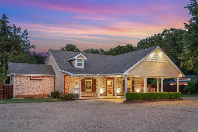 front view of a house with a yard