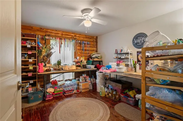 a children room with toys and a chandelier