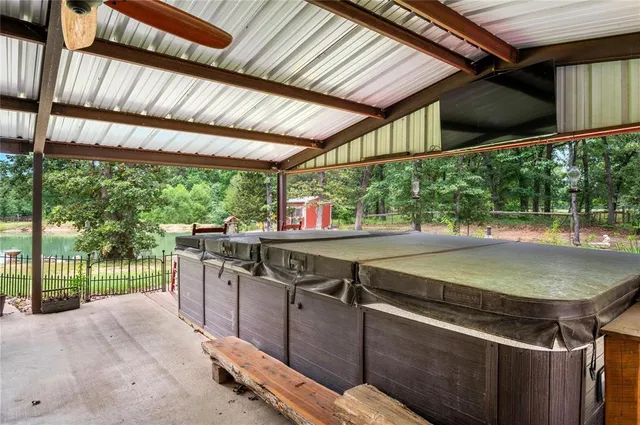a view of a backyard with sitting area