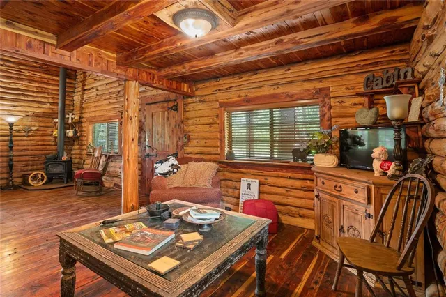 a group of people sitting on a sidewalk