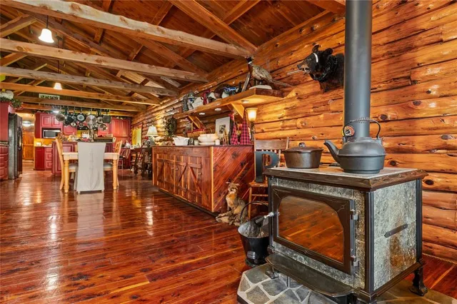 a utility room with lots of wooden furniture