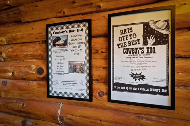 a view of a door and sign on the wall