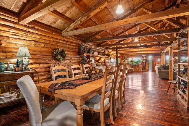 a view of a chairs and table in the patio