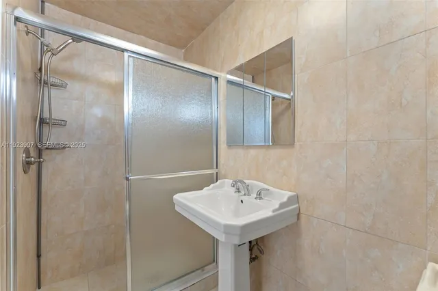 a kitchen with a stove and a microwave