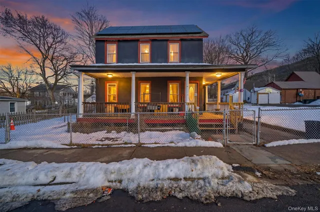 a front view of a house with entertaining space