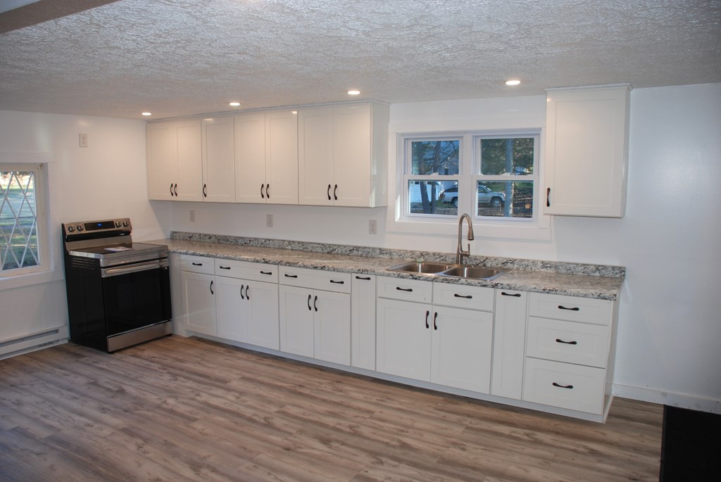 2242 Spruce Road Cherry Tree, PA 15724 - Photo 13 of 39 a kitchen with granite countertop a sink and cabinets
