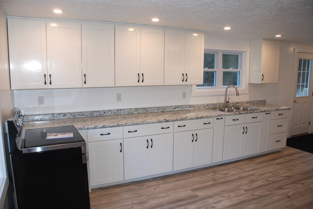 2242 Spruce Road Cherry Tree, PA 15724 - Photo 14 of 39 a kitchen with granite countertop cabinets stainless steel appliances and a counter top