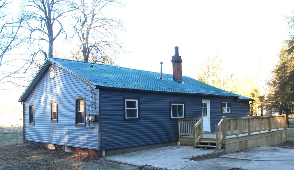 2242 Spruce Road Cherry Tree, PA 15724 - Photo 6 of 39 a front view of a house with a wooden fence