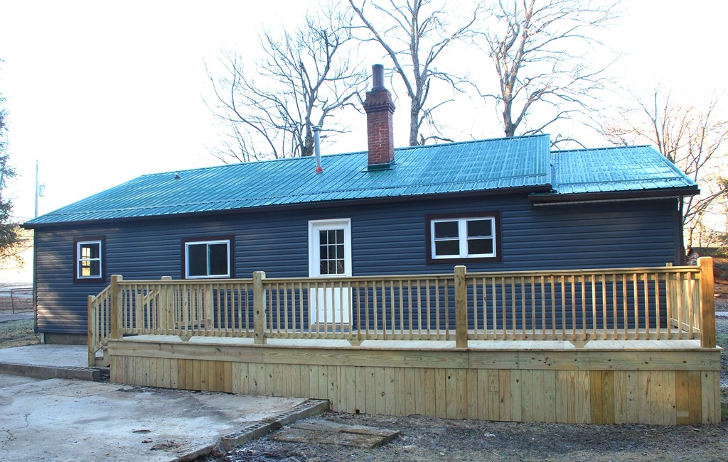 2242 Spruce Road Cherry Tree, PA 15724 - Photo 7 of 39 a front view of a house with a garden