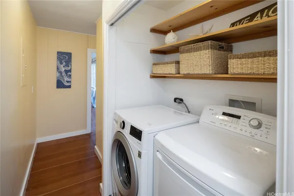 a utility room with dryer and washer