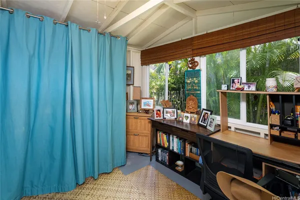 a room with furniture and a window