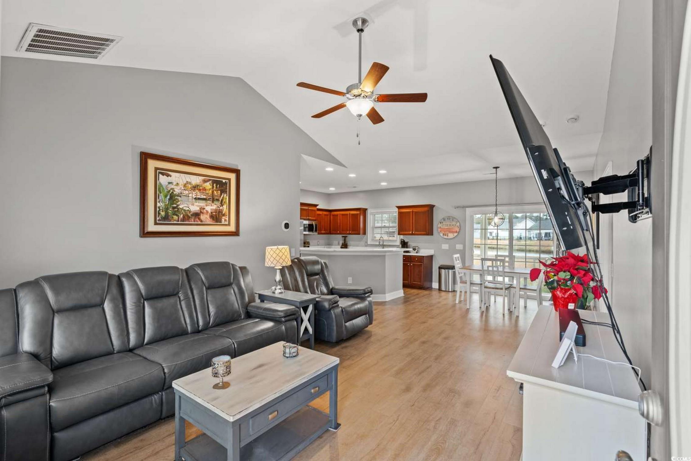 286 Copperwood Loop Conway, SC 29526 - Photo 6 of 40 Living room featuring ceiling fan, light wood finished floors, lofted ceiling, and recessed lighting