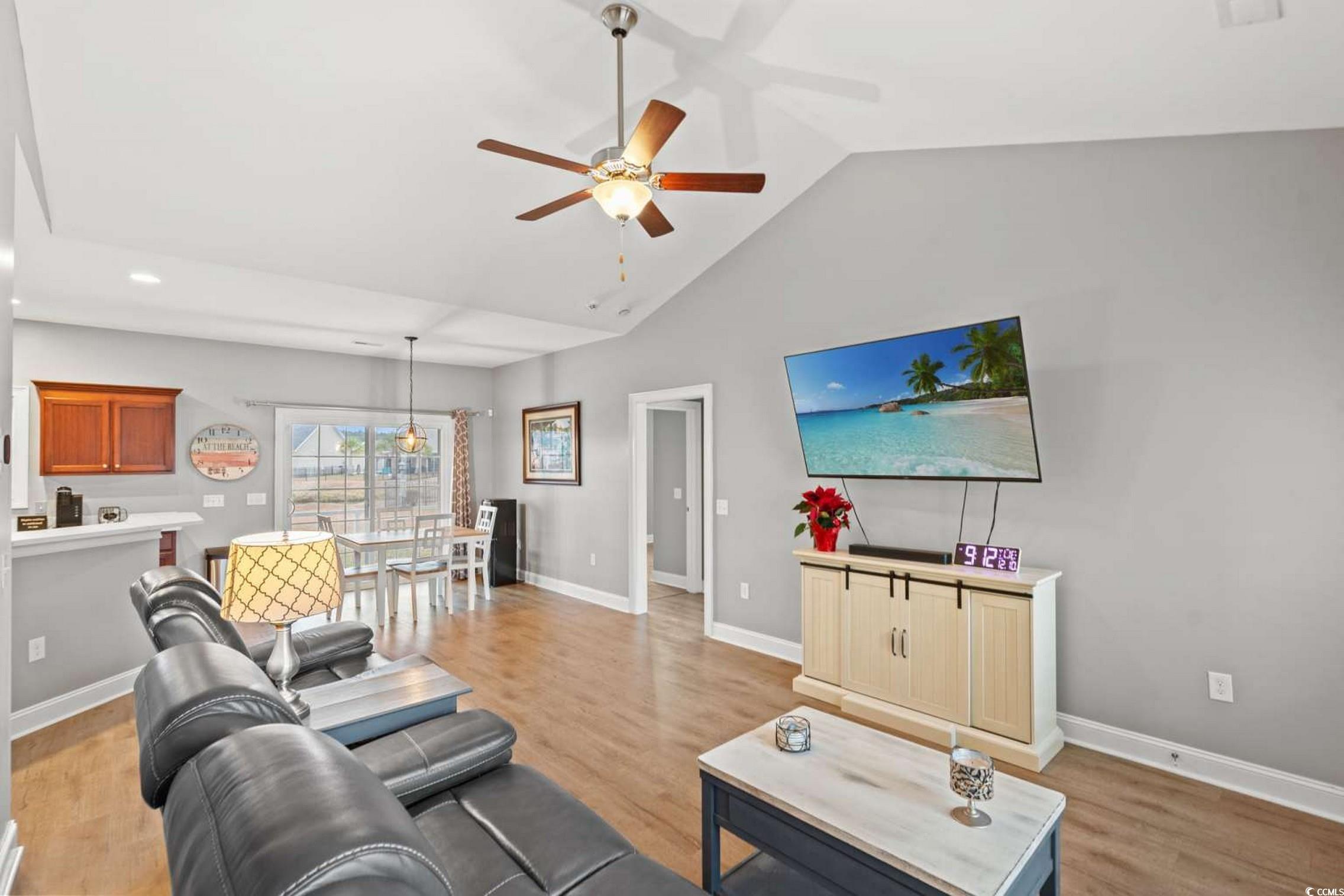 286 Copperwood Loop Conway, SC 29526 - Photo 7 of 40 Living room with light wood finished floors, a ceiling fan, and high vaulted ceiling