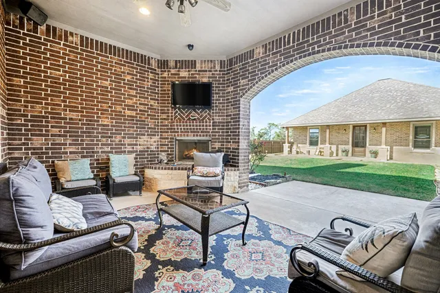 a backyard of a house with seating space