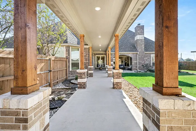 a view of swimming pool with outdoor seating