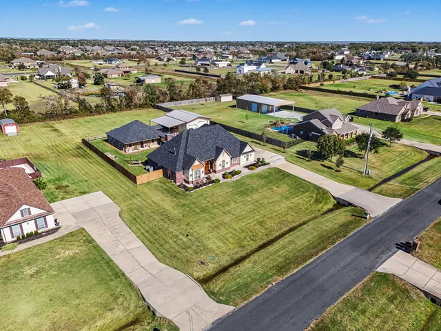 an aerial view of a pool