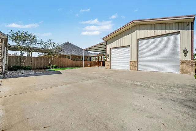 front view of a house with a street