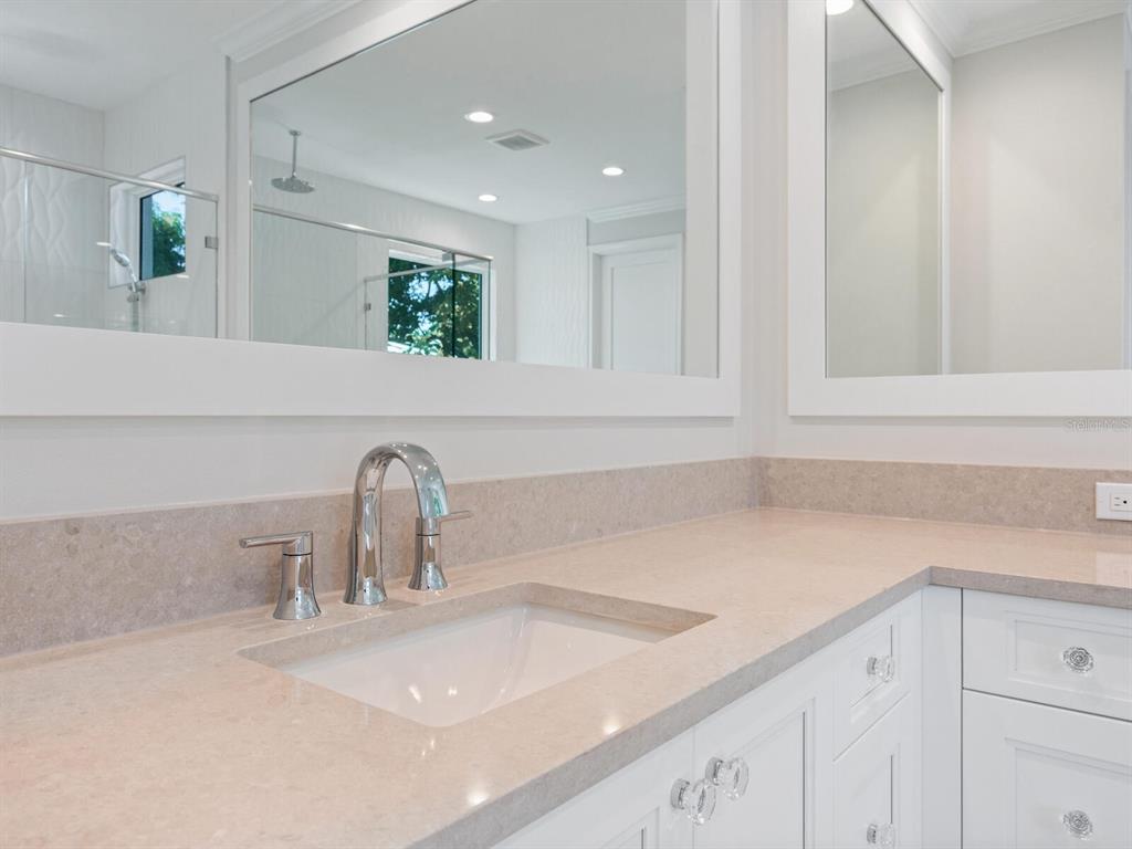 1876 Magnolia Street Sarasota, FL 34239 - Photo 21 of 72 a kitchen with a sink and cabinets