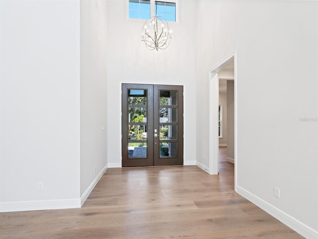 1876 Magnolia Street Sarasota, FL 34239 - Photo 23 of 72 a view of an entryway with wooden floor
