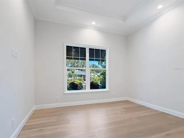 an empty room with closet area