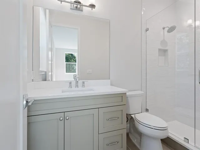 a view of a house with a lounge chair