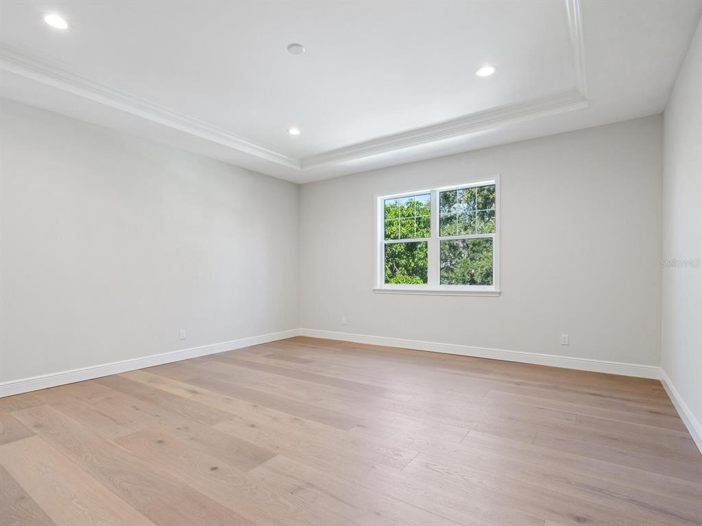 1876 Magnolia Street Sarasota, FL 34239 - Photo 32 of 72 an empty room with a window