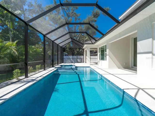 a view of a back yard of the house