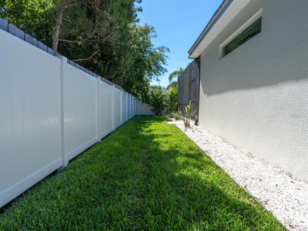1876 Magnolia Street Sarasota, FL 34239 - Photo 50 of 72 a view of a backyard with pathway