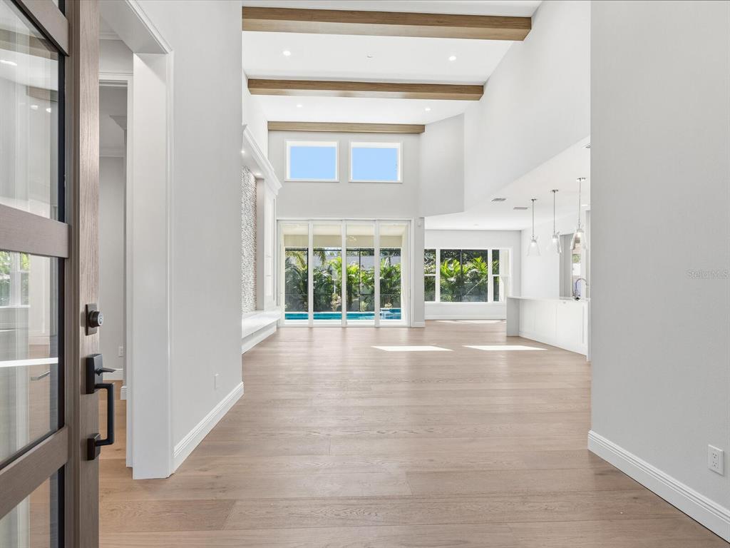 1876 Magnolia Street Sarasota, FL 34239 - Photo 6 of 72 a view of empty room with wooden floor and fan