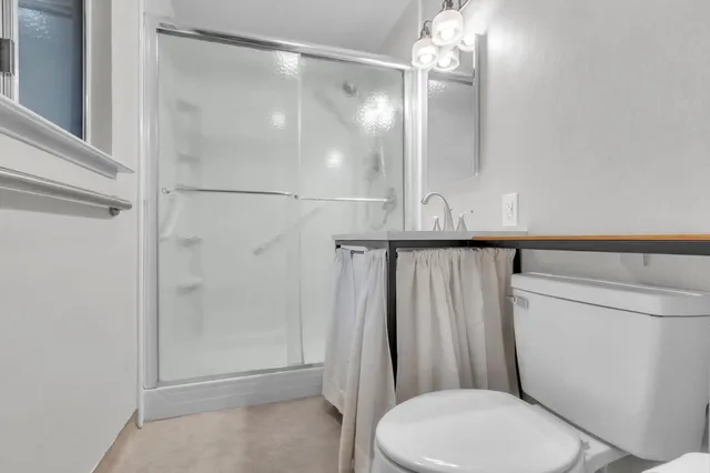 a view of front door with wooden floor