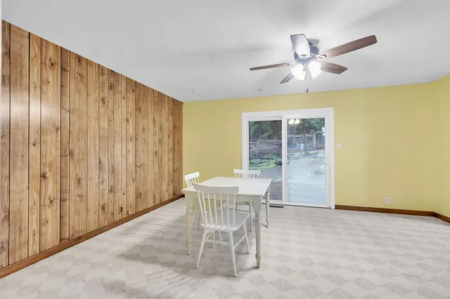 a kitchen with stainless steel appliances a refrigerator and microwave