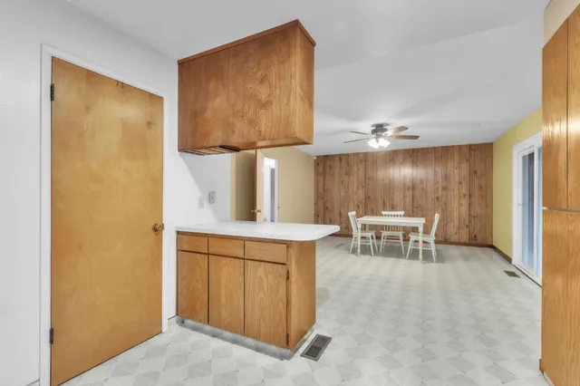 an aerial view of a house with a garden