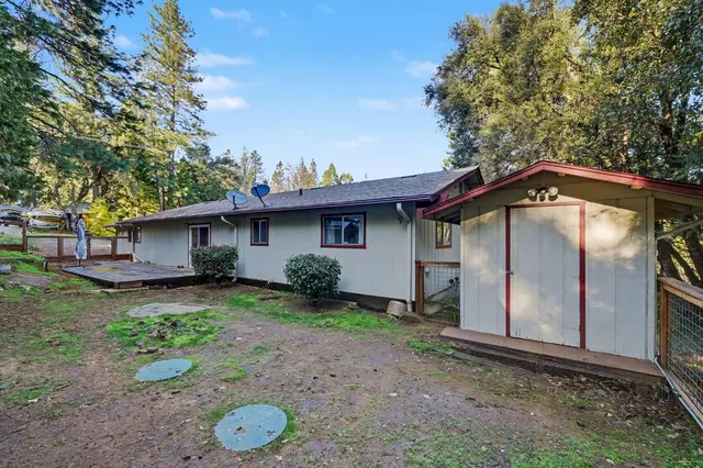 a house with a wooden fence