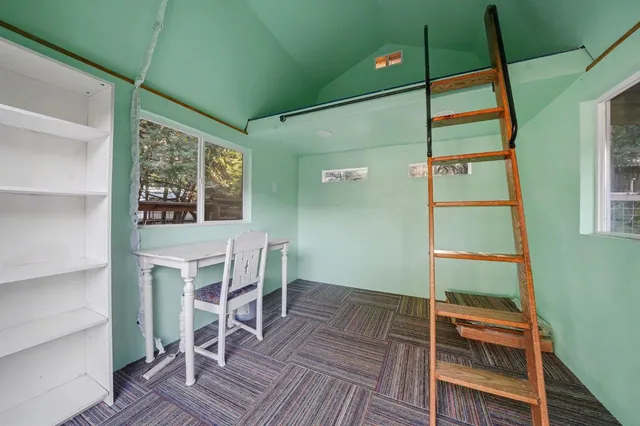 a house with trees in front of it