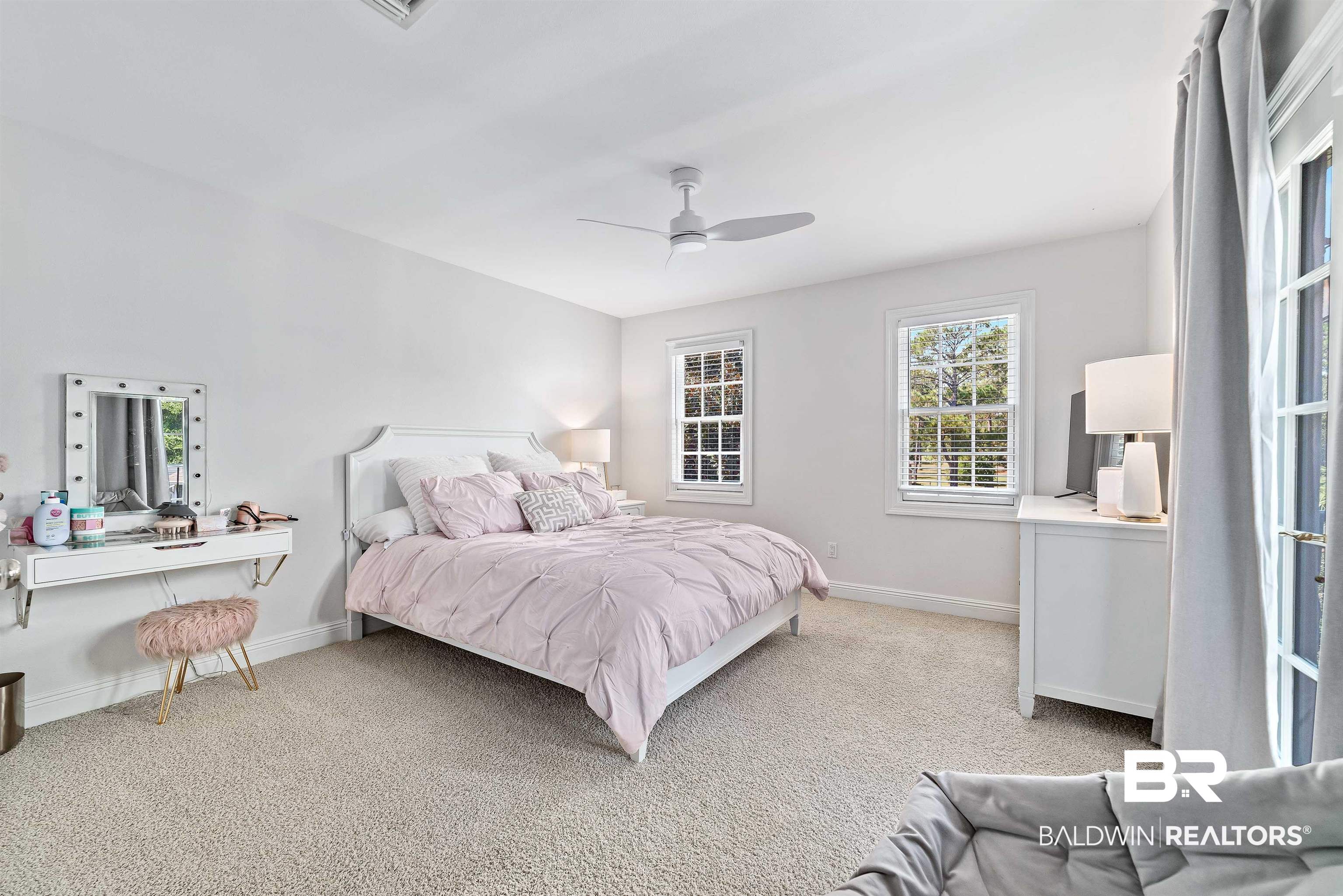 6630 East Quarry Drive Elberta, AL 36530 - Photo 27 of 63 Bedroom featuring light carpet and a ceiling fan